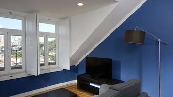 Superior Apartment, 1 Bedroom, City View | Living room | Flat-screen TV