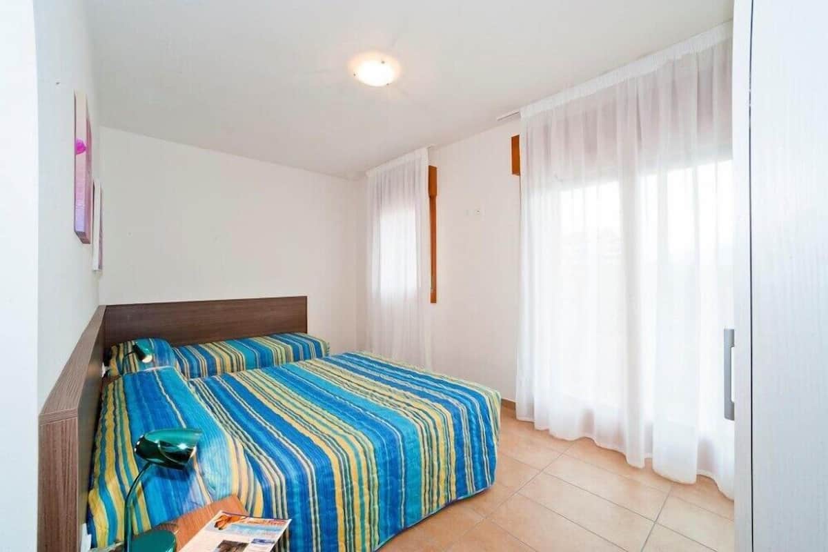 Apartment, 2 Bedrooms | Desk, free cots/infant beds