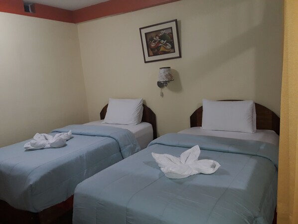 Standaard Twin kamer, 3 slaapkamers | Gratis wifi
