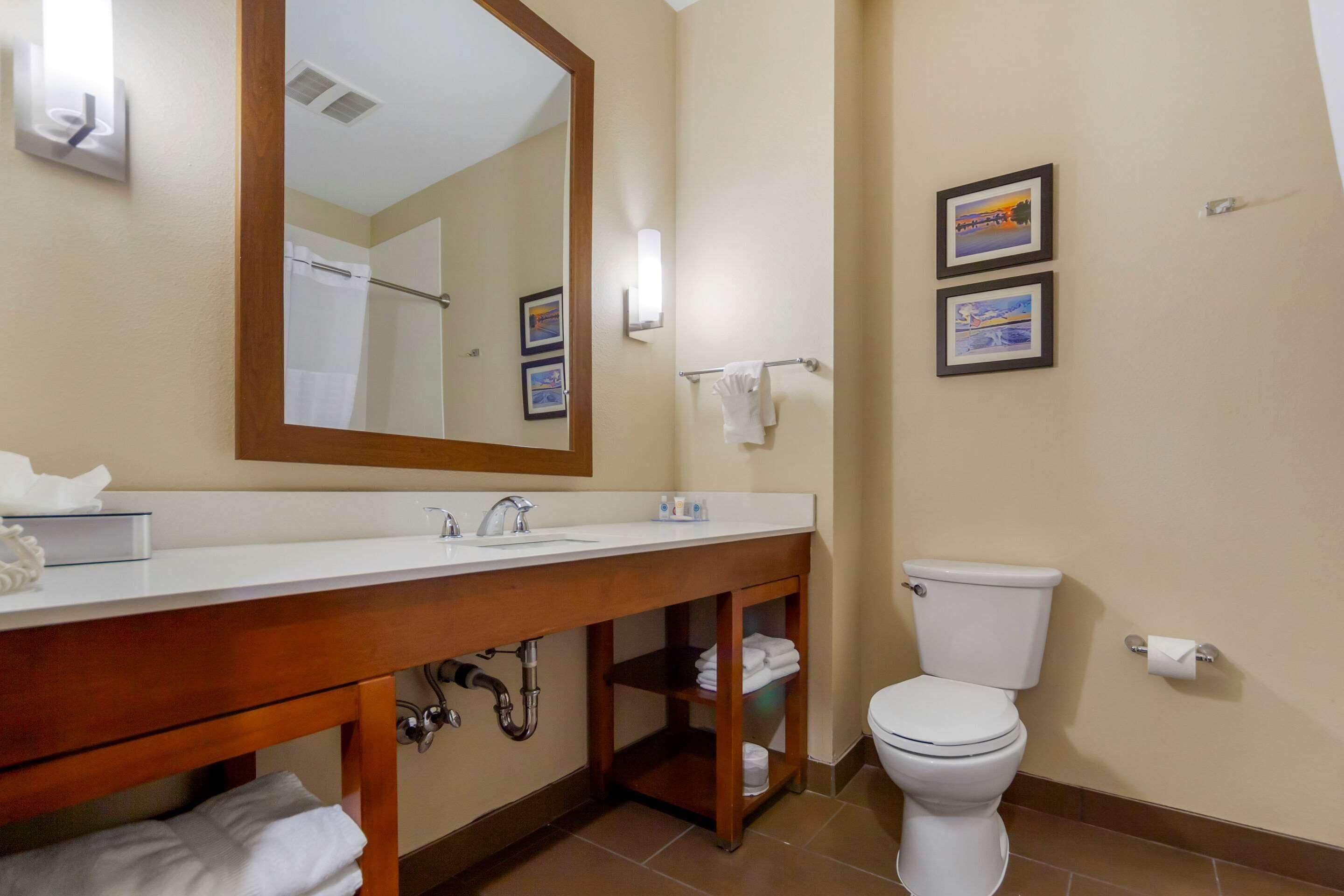 suite, multiple beds, non smoking | bathroom | combined shower/bathtub, rainfall showerhead, free toiletries