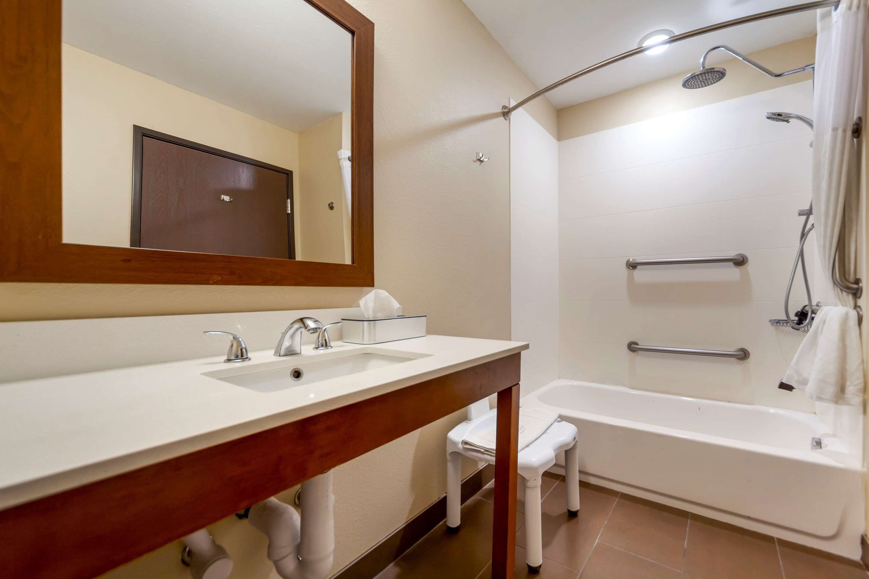 suite, multiple beds, accessible, non smoking | bathroom | combined shower/bathtub, rainfall showerhead, free toiletries