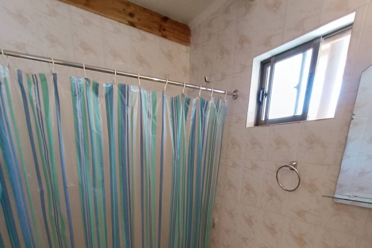 Standard Triple Room, Private Bathroom | Bathroom | Shower, towels, soap, toilet paper