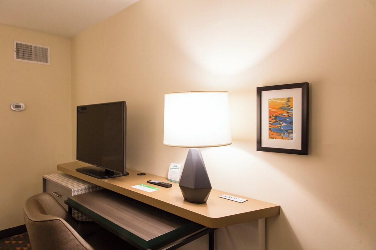 Premium bedding, down comforters, pillowtop beds, in-room safe