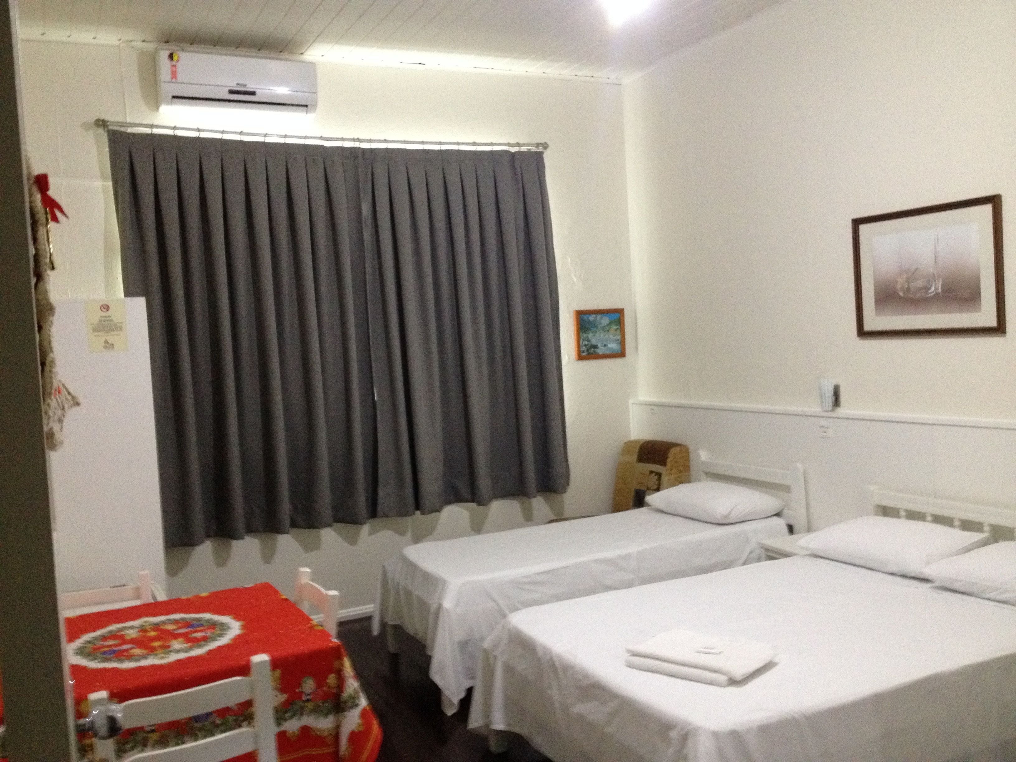 Family Triple Room | Minibar, desk, laptop workspace, blackout drapes