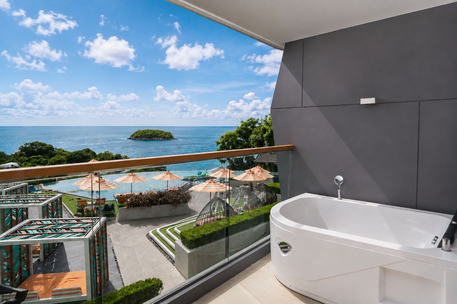 Un balcón con vistas al océano, un área de piscina con sombrillas y un baño moderno con bañera.