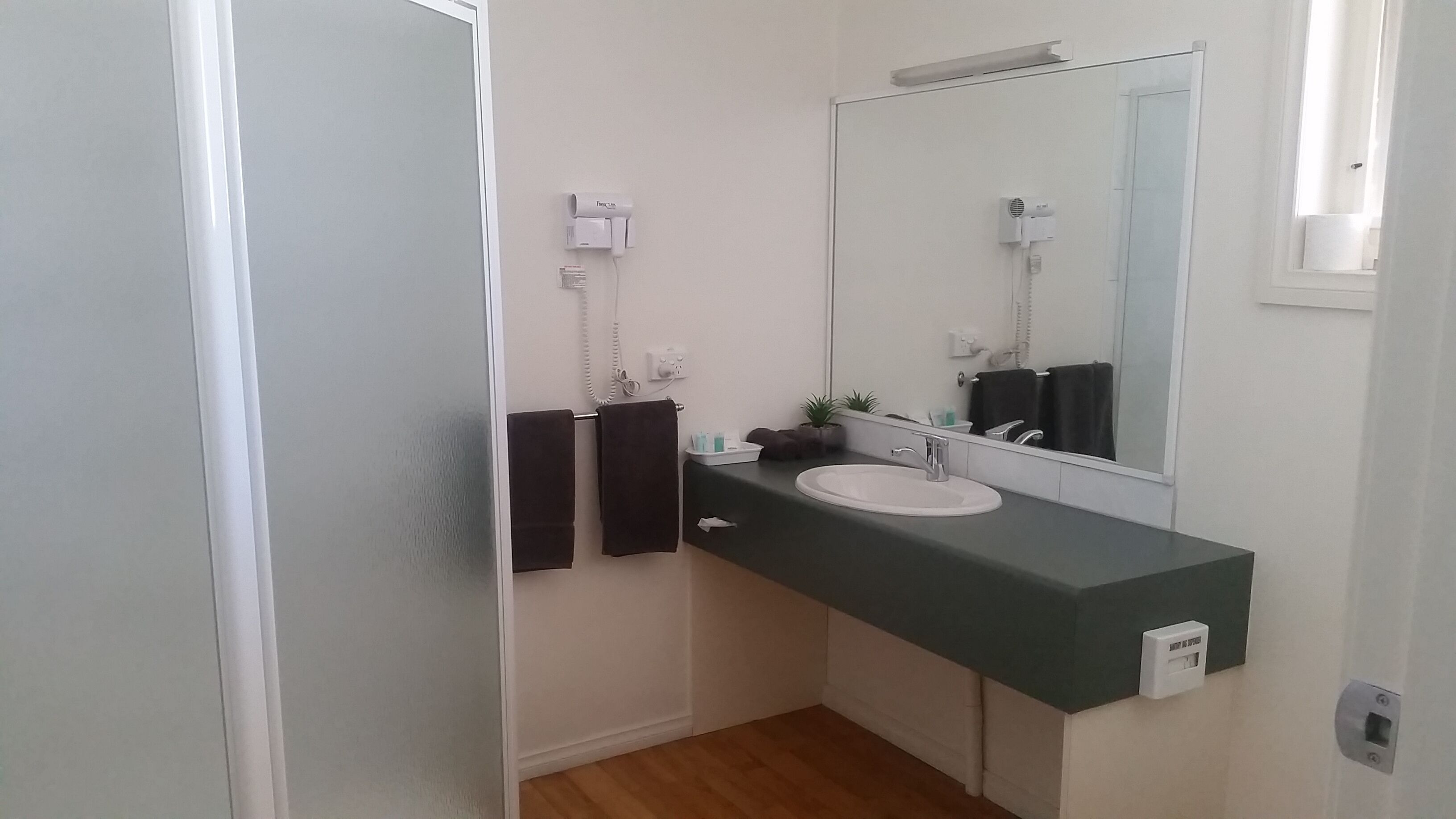 Shower, free toiletries, hair dryer, towels