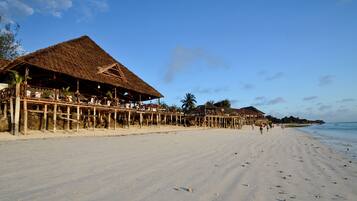 On the beach, white sand