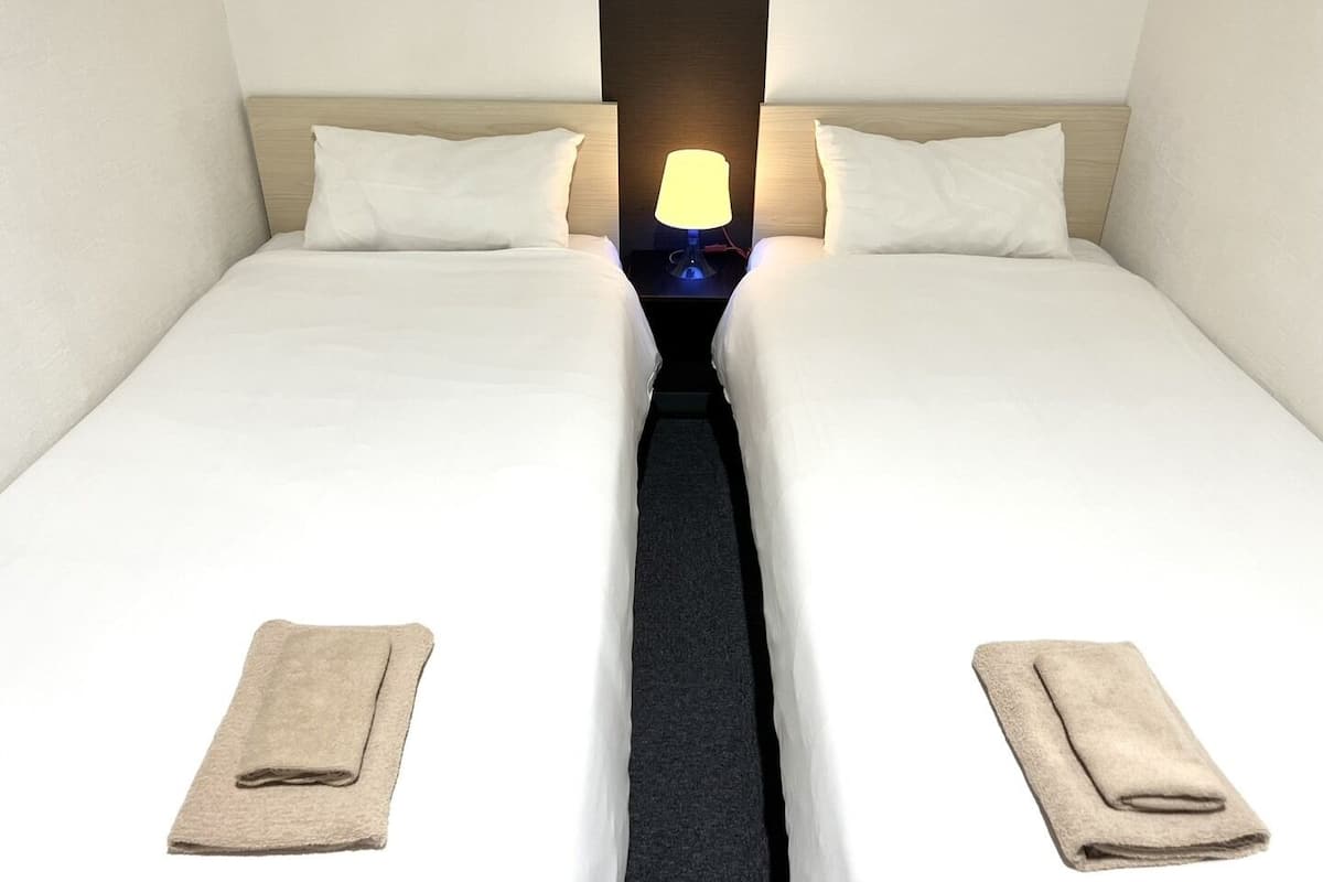 Twin Room, Non Smoking | Iron/ironing board, free WiFi, bed sheets