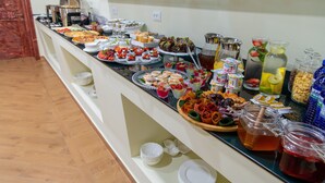 A buffet with various food items and beverages. - S&L Boutique Hotel  (Tbilisi)