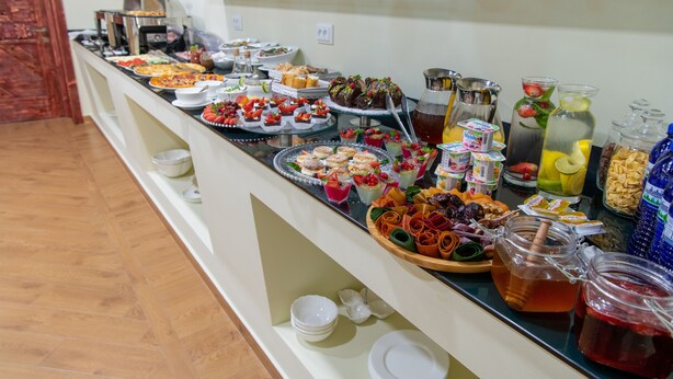 A buffet with various food items and beverages. - S&L Boutique Hotel  (Tbilisi)