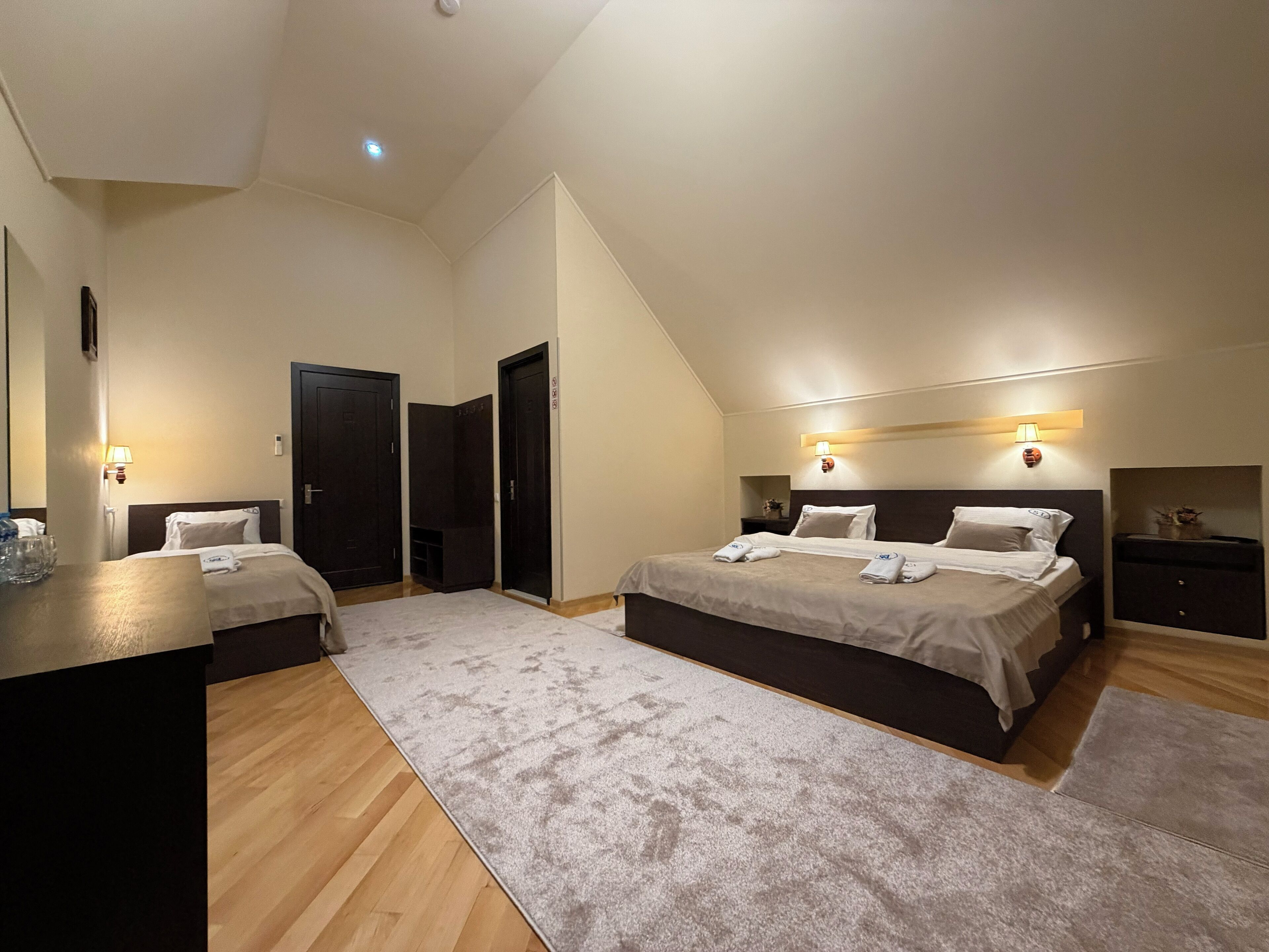 Family Triple Room, Balcony | Premium bedding, minibar, in-room safe, desk
