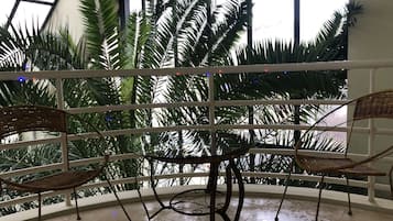 Deluxe Room, Balcony, Garden View | 1 bedroom, premium bedding, minibar, in-room safe