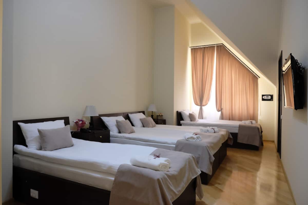 Classic Quadruple Room | 1 bedroom, premium bedding, minibar, in-room safe