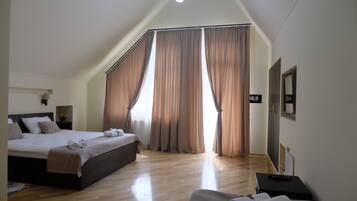 Family Triple Room, Balcony | Premium bedding, minibar, in-room safe, desk