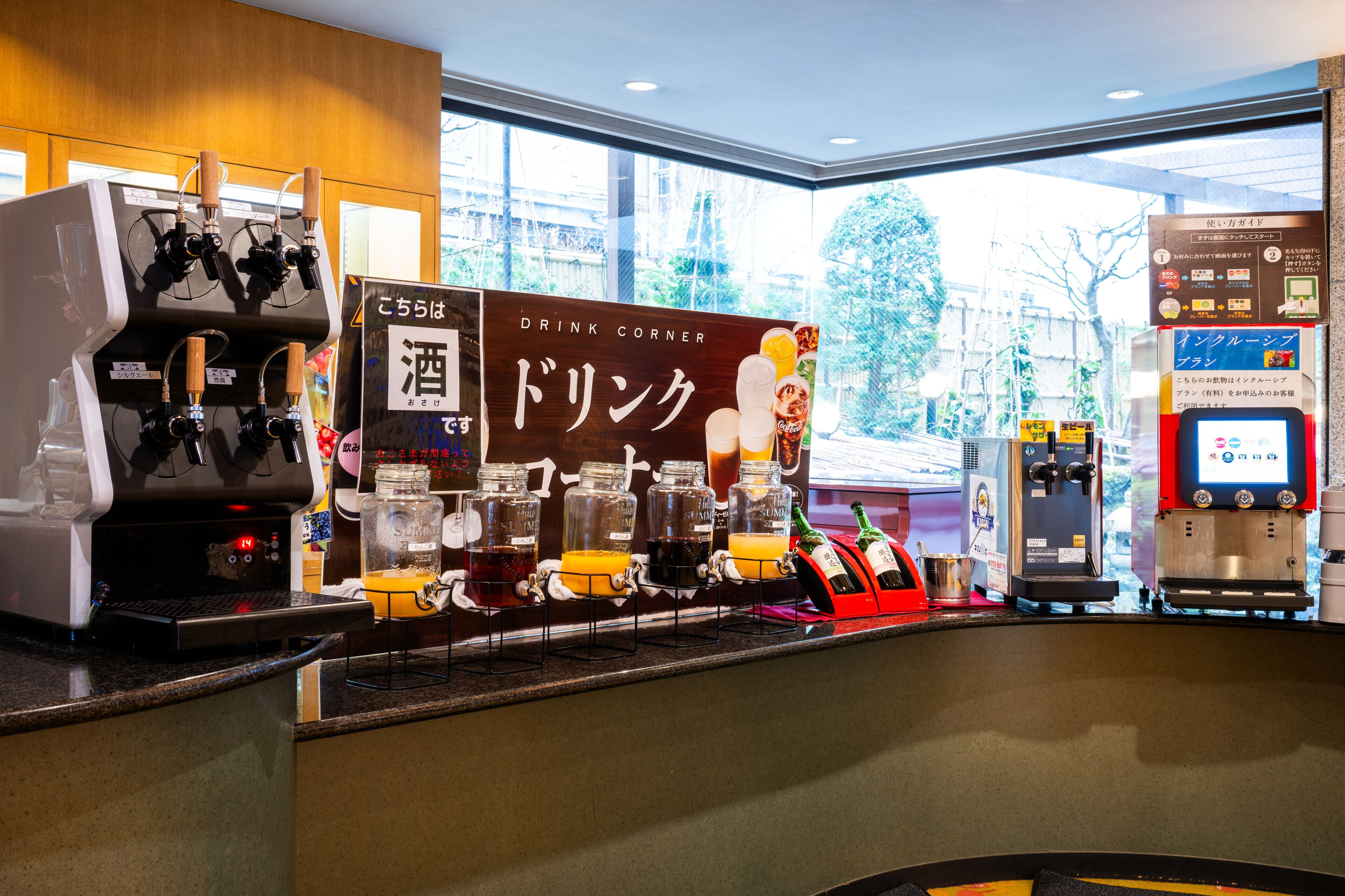 A drink station with multiple beverage dispensers and a menu board.