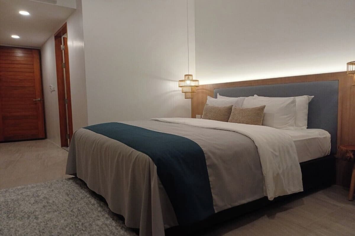 Honeymoon Room | Minibar, in-room safe, individually decorated, blackout curtains