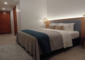 Honeymoon Room | Minibar, in-room safe, individually decorated, blackout curtains