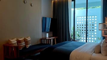 Family Room, 1 Bedroom, Non Smoking | Minibar, in-room safe, individually decorated, blackout drapes