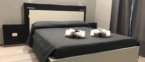 Standard Room | Individually decorated, individually furnished, desk, blackout curtains