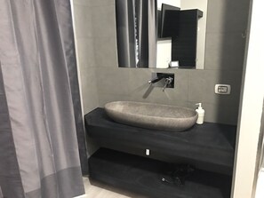 Tremannsrom | Vask på badet