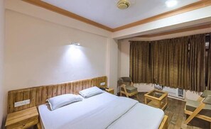 Deluxe Room, 1 Queen Bed, Refrigerator, Garden View | Premium bedding, minibar, in-room safe, desk