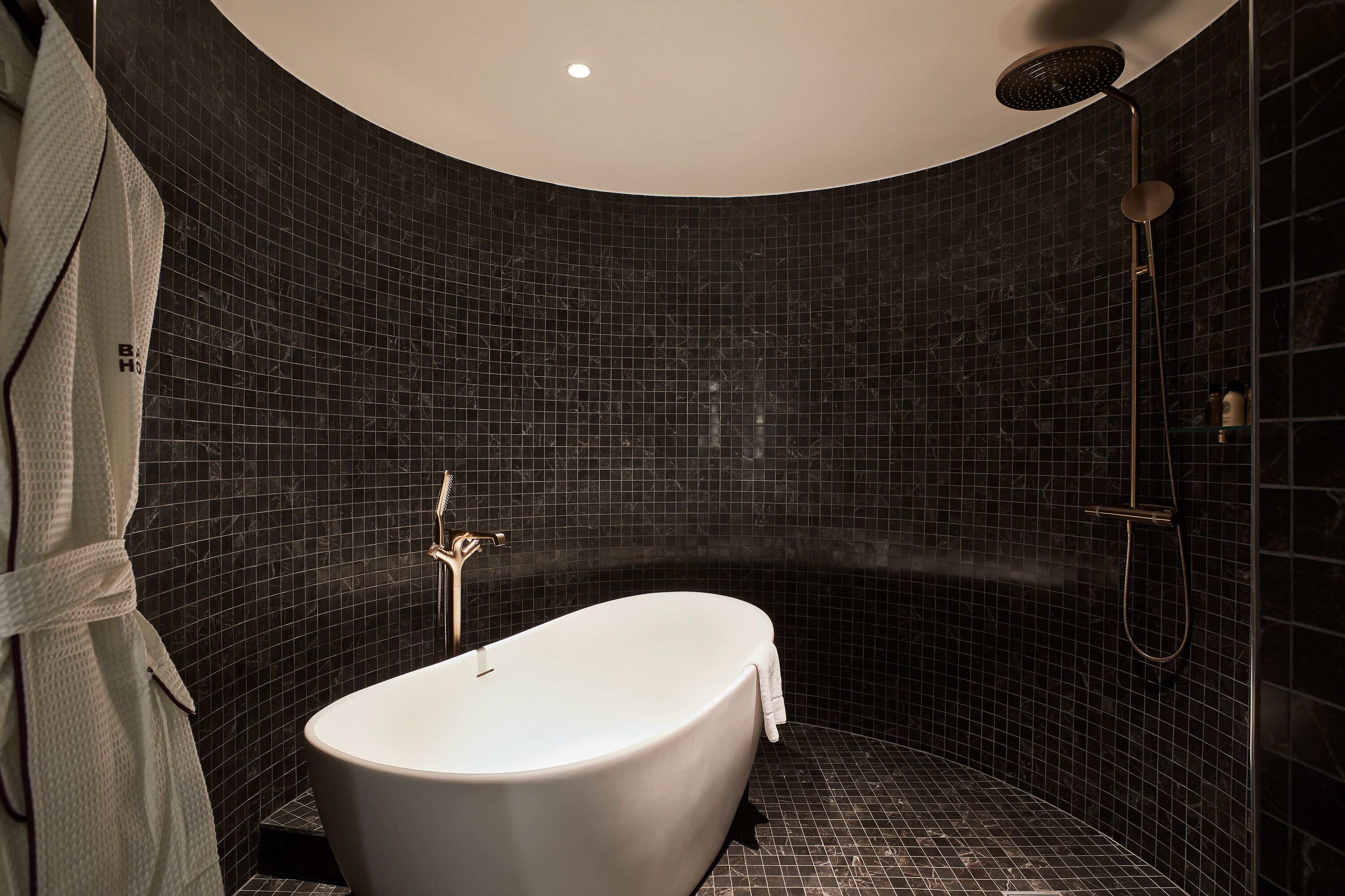 Designer toiletries, hair dryer, bathrobes, slippers