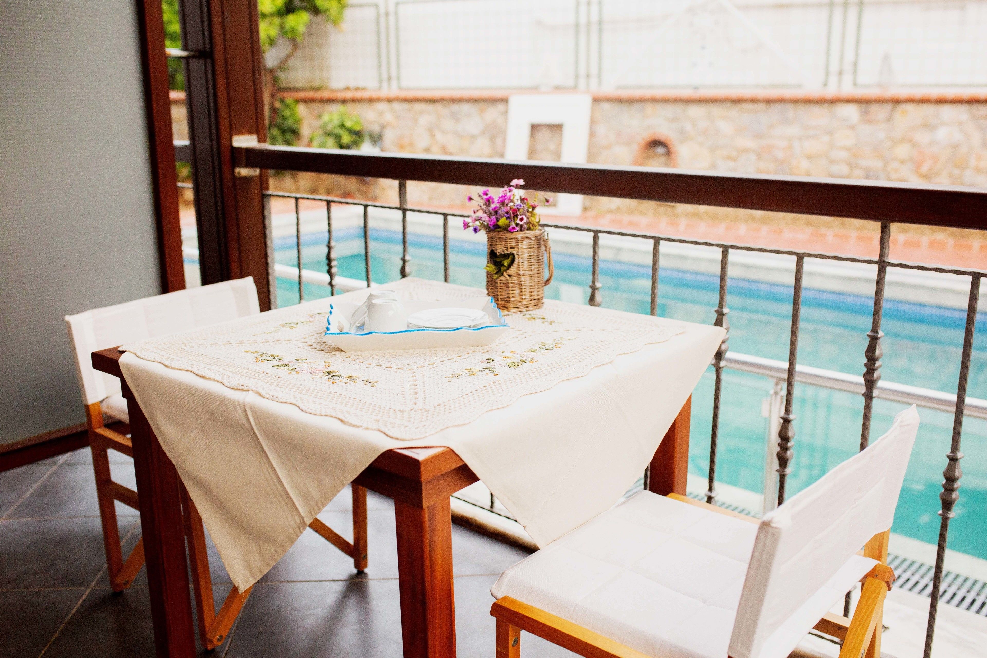 family apartment, 2 bedrooms with kitchen and pool view  | living area | 32-inch lcd tv with satellite channels, tv