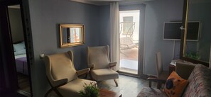 Appartement Économique, balcon | Coin séjour