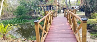 Amazing Jungle Tree House right over the river with bikes and canoe 
