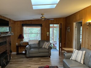 Smart TV, fireplace, books