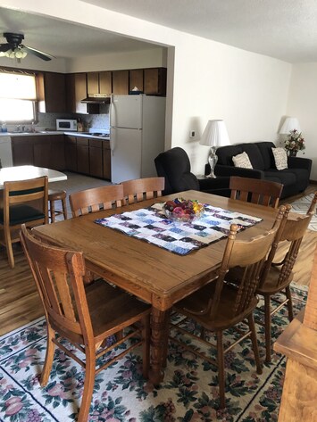 Open dining area flows to living room and kitchen