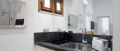 Fridge, microwave, stovetop, coffee/tea maker