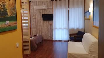 1 chambre, fer et planche Ă repasser, Wi-Fi, draps fournis