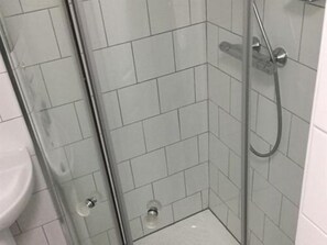 Regadera en el baño