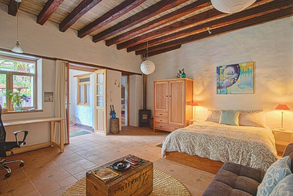 1 bedroom, desk, iron/ironing board, travel crib