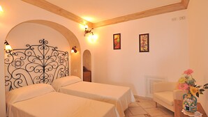 A room with two beds, a wooden ceiling, and two wall-mounted light fixtures. - Mare - Positano Center - Guest 4+1 People in 2 Bedrooms, 2 Bathrooms - AC & WiFi (Positano)