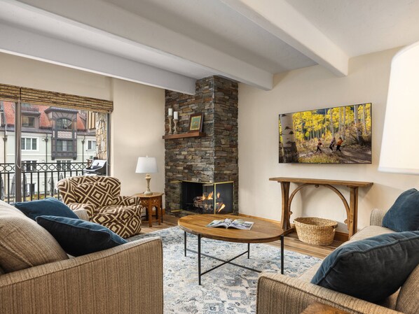 Flat-screen TV, fireplace