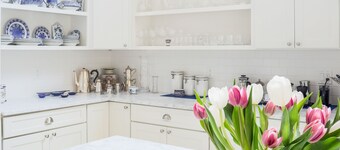 SUNNY, OPEN AND SPACIOUS TASTEFULLY RENOVATED OASIS TWO MINUTES TO TOWN