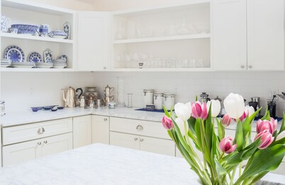 SUNNY, OPEN AND SPACIOUS TASTEFULLY RENOVATED OASIS TWO MINUTES TO TOWN