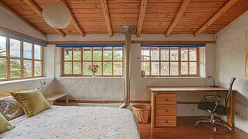 1 bedroom, desk, iron/ironing board, travel crib