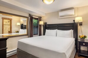 1 habitación, tabla de planchar con plancha y cuna de viaje 