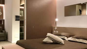 Luxe beddengoed, een minibar, een kluis op de kamer, een bureau