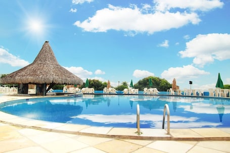 Indoor pool, outdoor pool, open 9:00 AM to 6:30 PM, pool umbrellas