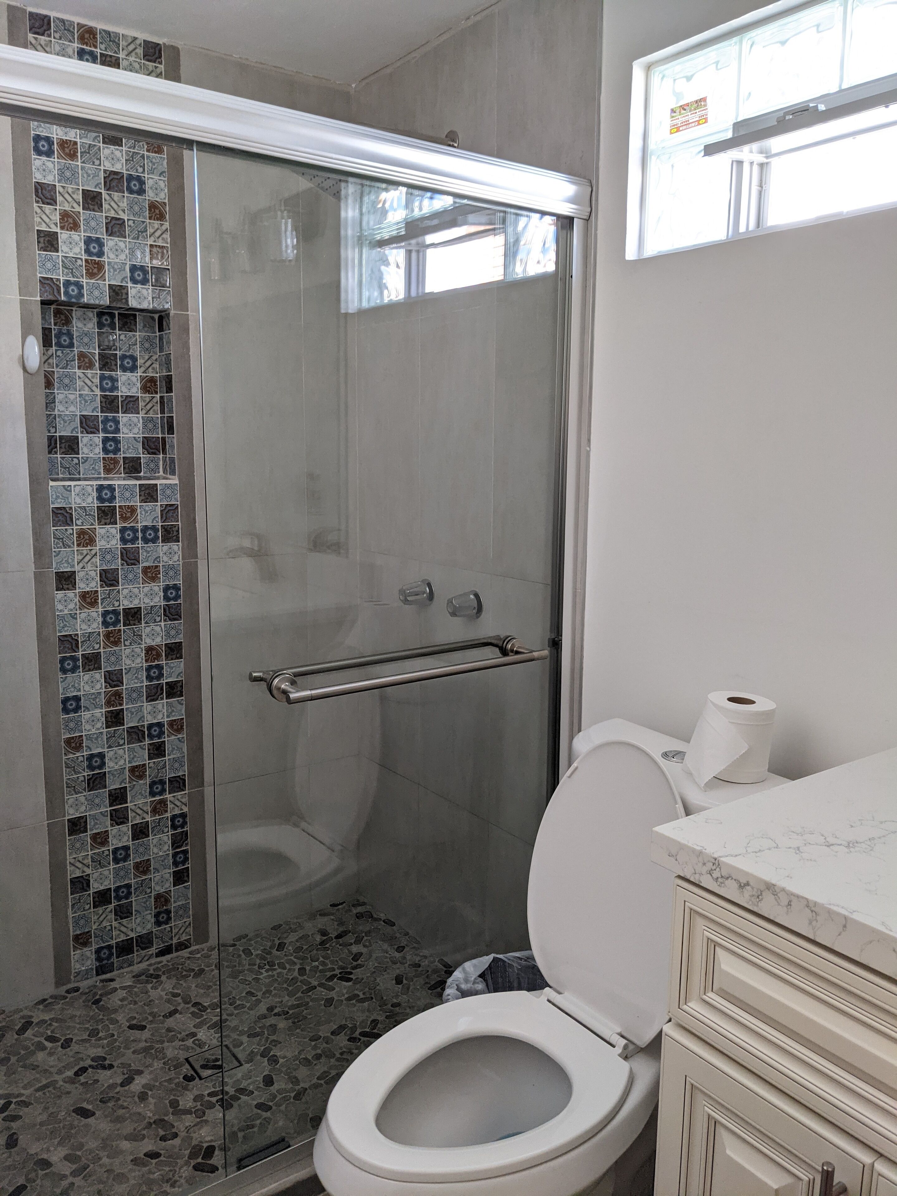 Shower, towels, soap, shampoo