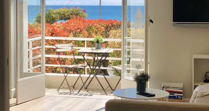 Uusi huoneisto merinäköalalla ja puutarha kävelykadulla