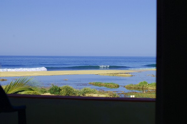 On the beach, sun loungers, beach towels