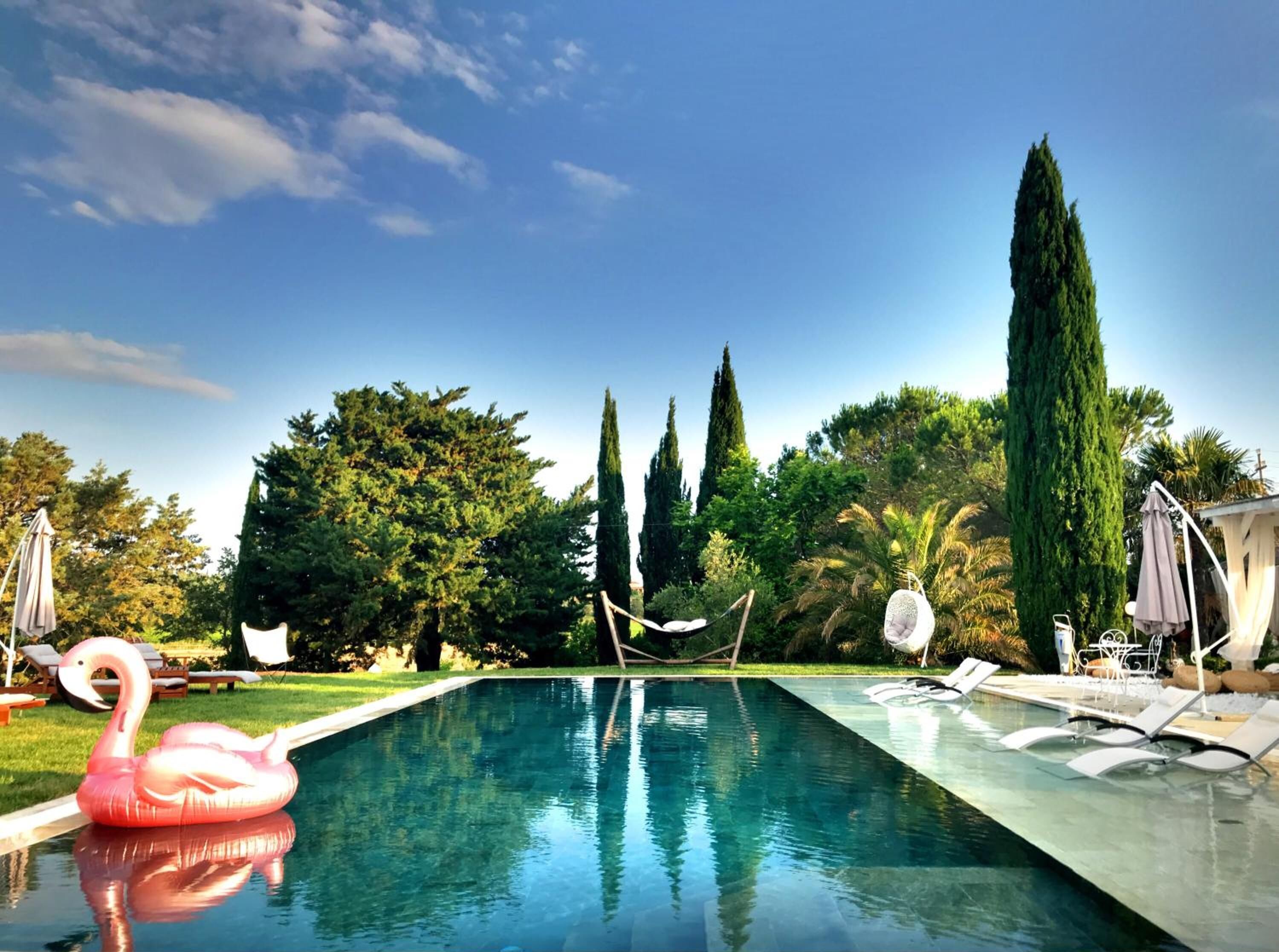 Outdoor pool, pool umbrellas, pool loungers