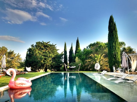 Outdoor pool, pool umbrellas, sun loungers