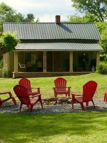 Sunny days at the cottage enjoy shade on the porch.