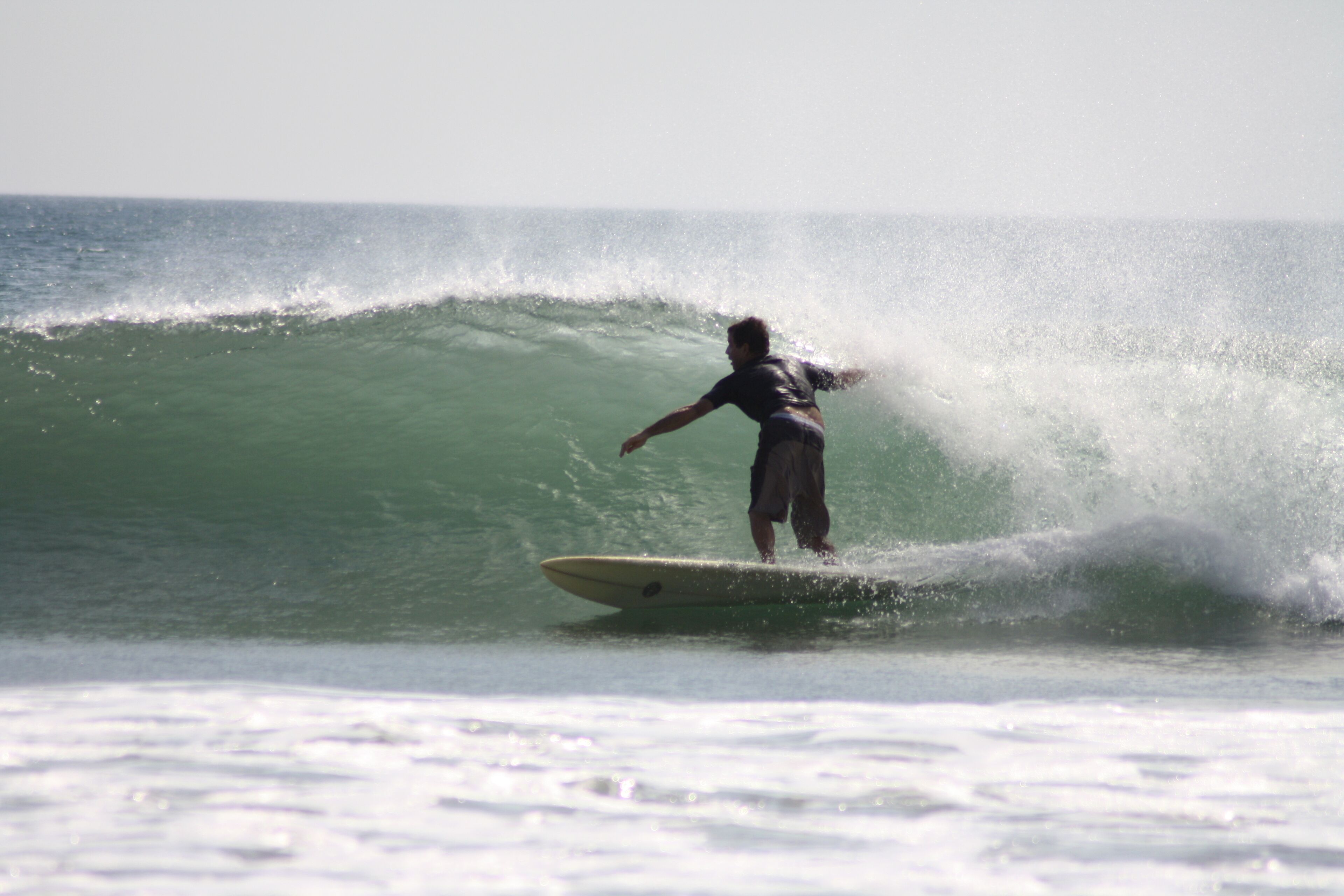 A person surfing on a wave.